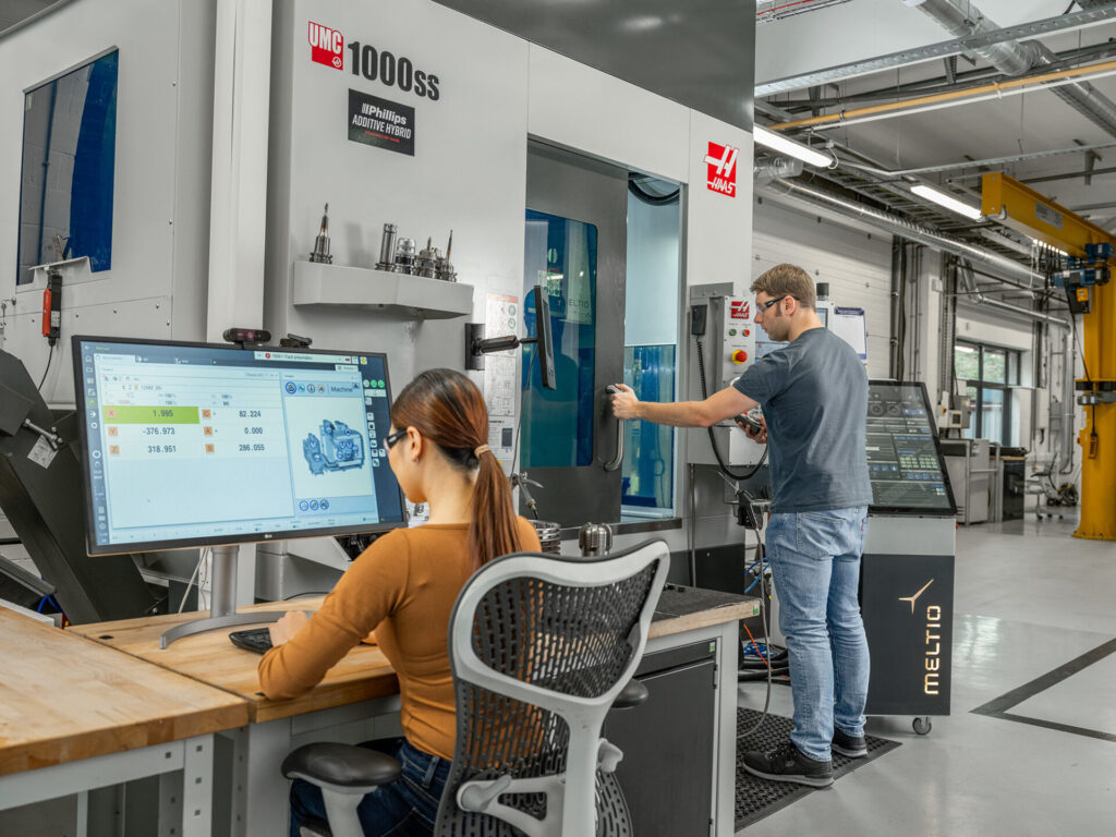 Highlights versatile CNC machinery at work, demonstrating its role in modern, efficient manufacturing processes.