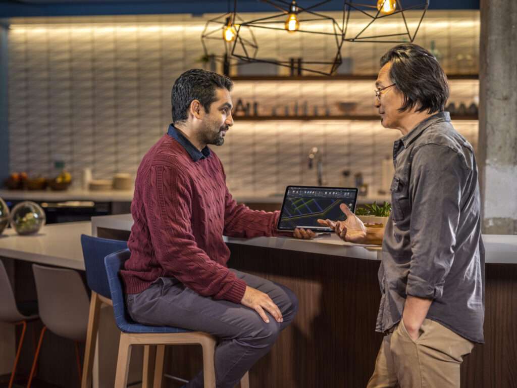 People using AutoCAD in a mobile environment.