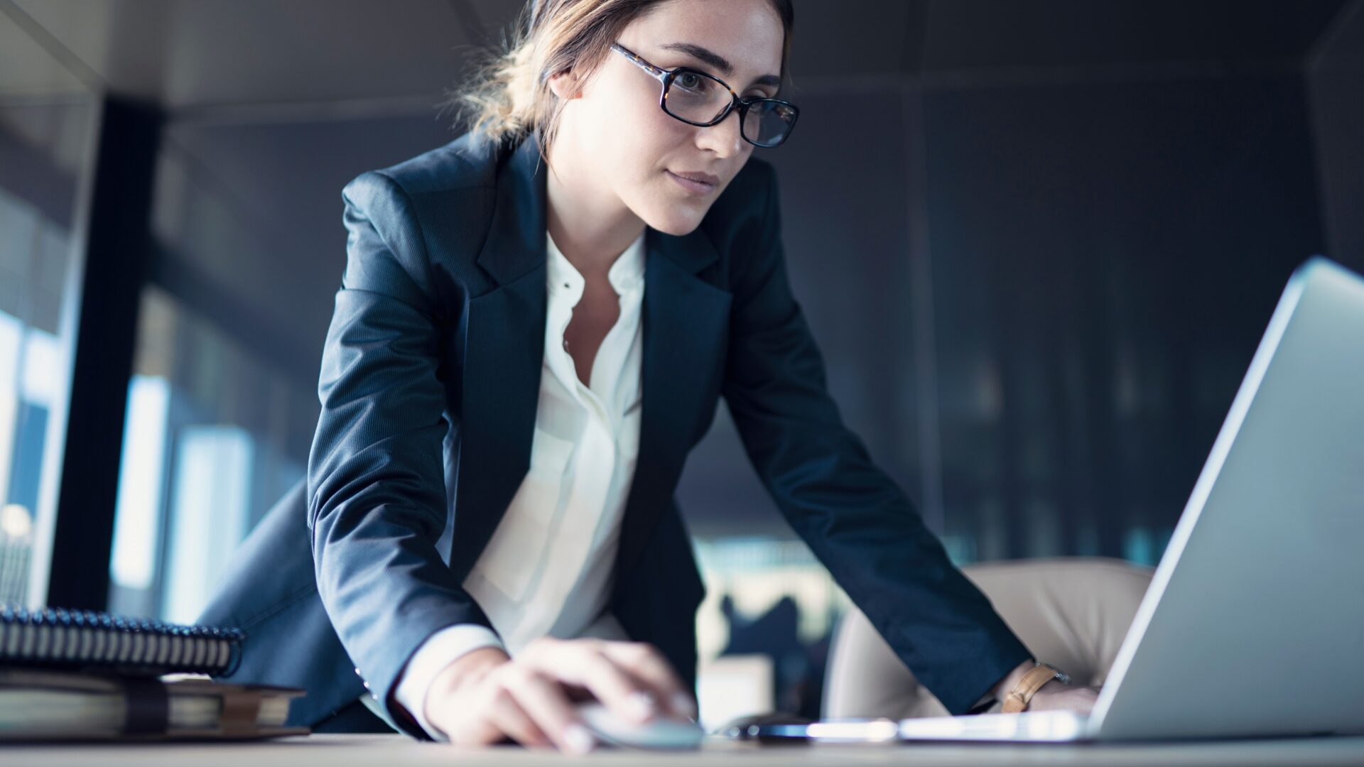 Businesswoman working on the laptop