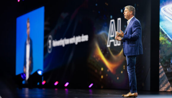 speaker on stage at autodesk university