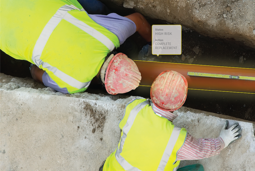 construction workers looking into trench