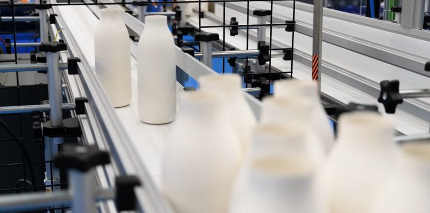 Pulpex paper bottles on assembly line