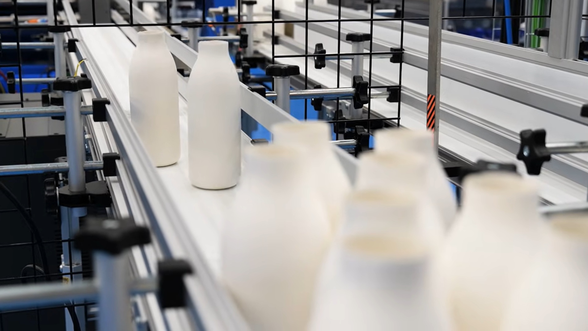 Pulpex paper bottles on assembly line